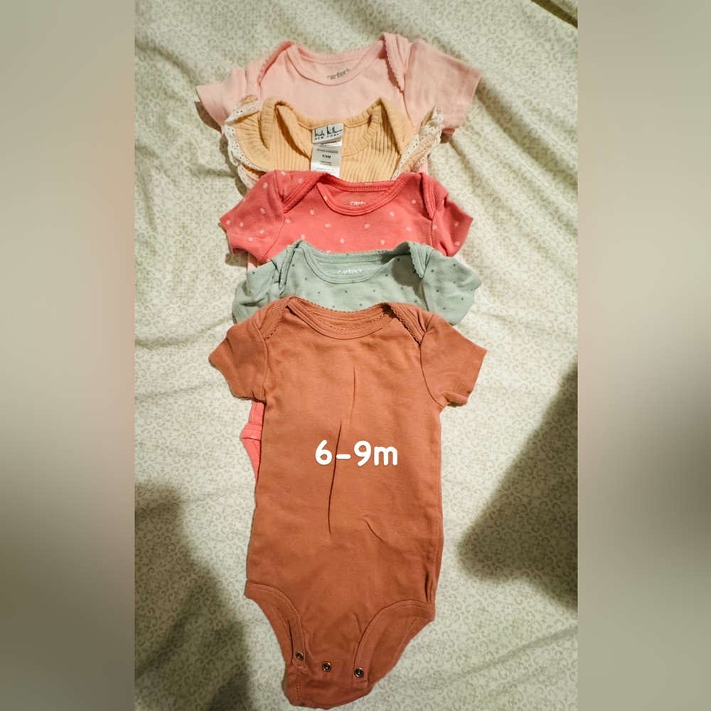 24 total Sleep and play onesies lot
